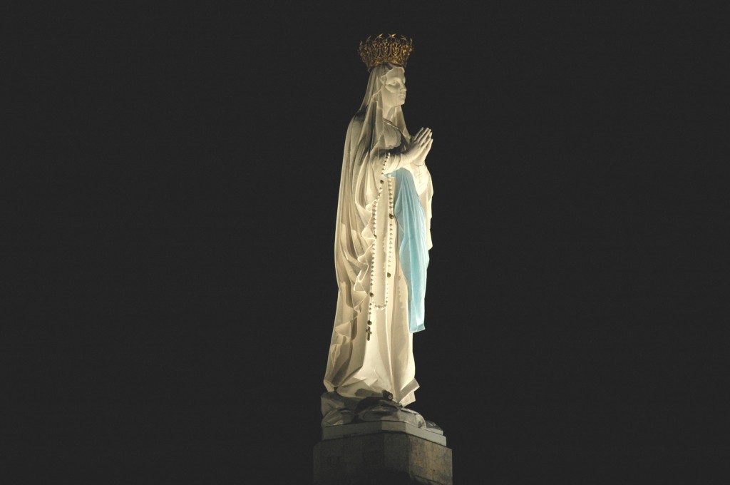 The statue of Mary in Lourdes, in front of the Basilica.
